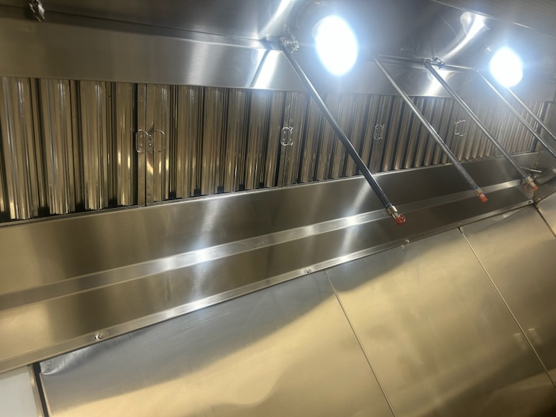 Stainless steel vent hood interior after cleaning